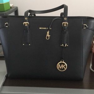 Michael Kors black purse.